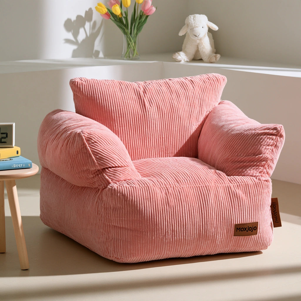 Pink round corduroy bean bag style pouf from decodavenport, soft ribbed fabric, perfect for living room or cozy seating.