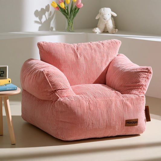 Pink round corduroy bean bag style pouf from decodavenport, soft ribbed fabric, perfect for living room or cozy seating.